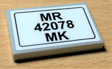 Part 26603pb110 - Tile 2 x 3 with Black 'MR 42078 MK' on White Background Pattern (Sticker) - Set 42078 - De BrickPlaats