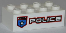 Part 3001pb089L - Brick 2 x 4 with Police White Star Badge and White 'POLICE' with Red Outline Pattern Model Left Side (Sticker) - Set 8301 - De BrickPlaats