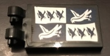 Part 30350bpb092 - Tile, Modified 2 x 3 with 2 Clips with Ravenclaw Banner Pattern (Sticker) - Set 71043 - De BrickPlaats