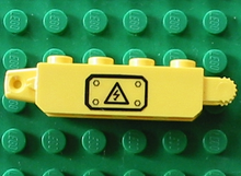 Part 30387pb001La - Hinge Brick 1 x 4 Locking, 9 Teeth with Black Electricity Danger Sign on Transparent Background Pattern Model Left Side (Sticker) - Set 7248 - De BrickPlaats