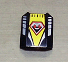 Part 30602pb023 - Slope, Curved 2 x 2 Lip with Coast Guard Logo on Yellow Background Pattern - De BrickPlaats