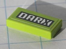 Part 3069pb0119 - Tile 1 x 2 with Black and White 'DARX' Pattern (Sticker) - Set 8119 - De BrickPlaats