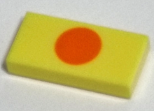 Part 3069pb1003 - Tile 1 x 2 with Orange Circle Pattern - De BrickPlaats