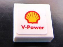 Part 3070pb076 - Tile 1 x 1 with Shell Logo and 'V-Power' Pattern (Sticker) - Set 30190 - De BrickPlaats