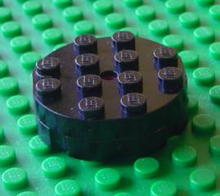 Part 3404ac02 - Turntable 4 x 4 Complete, Faceted with Indented Base - De BrickPlaats
