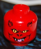 Part 3626pb0389 - Minifigure, Head Alien Devil with Horns, Yellow Eyes, White Fangs, and Bright Pink Tongue Pattern - De BrickPlaats