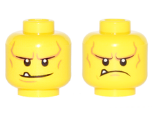 Part 3626pb1548 - Minifigure, Head Dual Sided Black Eyebrows, White Pupils, Chin Dimple and Cheek Lines, Smile with Tooth / Frown Angry Pattern - De BrickPlaats