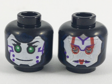 Part 3626pb2062 - Minifigure, Head Dual Sided Alien Female with White Face, Green Eyes and Purple Marks on Cheek / Red and Silver Armor Pattern - De BrickPlaats