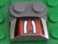 Part 41855pb09 - Slope, Curved 2 x 2 x 2/3 with 2 Studs and Curved Sides, Lip End with Silver/Black/Red Number 3 Left Half Pattern - De BrickPlaats