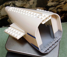 Part 54701c01pb01 - Aircraft Fuselage Aft Section Curved with Light Bluish Gray Base with Dark Bluish Gray and Blue Stripes Pattern - De BrickPlaats