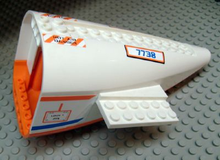Part 54701c03pb01 - Aircraft Fuselage Aft Section Curved with Orange Base with Orange and Blue Stripes, 'Hot Air Danger' and '7738' Pattern (6 Stickers) - Set 7738 - De BrickPlaats