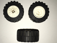Part 55982c05 - Wheel 18mm D. x 14mm with Axle Hole, Fake Bolts and Shallow Spokes with Black Tire 30.4 x 14 Offset Tread Band Around Center of Tread (55982 / 92402) - De BrickPlaats