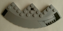 Part 58846pb15R - Brick, Round Corner 10 x 10 with Slope 33 Edge, Axle Hole, Facet Cutout with Spikes and Dark Blue Stripe Pattern Model Right Side (Stickers) - Set 75042 - De BrickPlaats