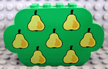 Part 6214px1 - Slope, Curved 8 x 2 x 4 Triple with 8 Studs with Yellow Pears Pattern - De BrickPlaats