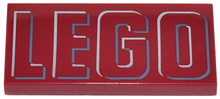 Part 87079pb1046 - Tile 2 x 4 with Silver and Dark Bluish Gray Outlined 'LEGO' Pattern - De BrickPlaats