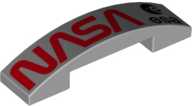 Part 93273pb157 - Slope, Curved 4 x 1 x 2/3 Double with Red 'NASA' and Black 'esa' Logo on Metallic Silver Background Pattern - De BrickPlaats