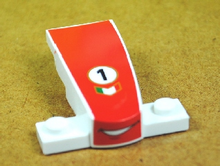 Part 93589pb002 - Wedge 4 x 2 x 1 1/3 with 1 x 4 Base with Smile and Number 1 on Red Background Pattern (Cars Francesco Bernoulli) - De BrickPlaats