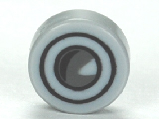 Part 98138pb006 - Tile, Round 1 x 1 with Headlight Pattern - De BrickPlaats