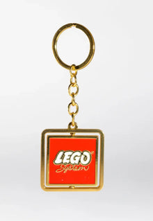 Gear 5007091 - VIP 1964 LEGO Logo Drehbarer Schlüsselanhänger